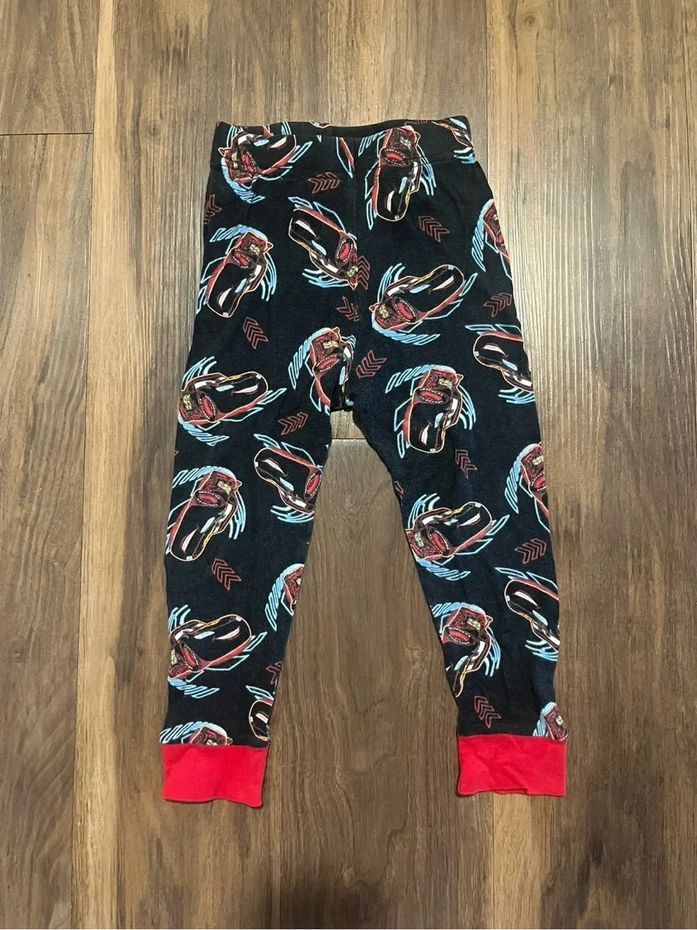 Black Kids' Pajama Pants with Red Cuffs and Race Car Print